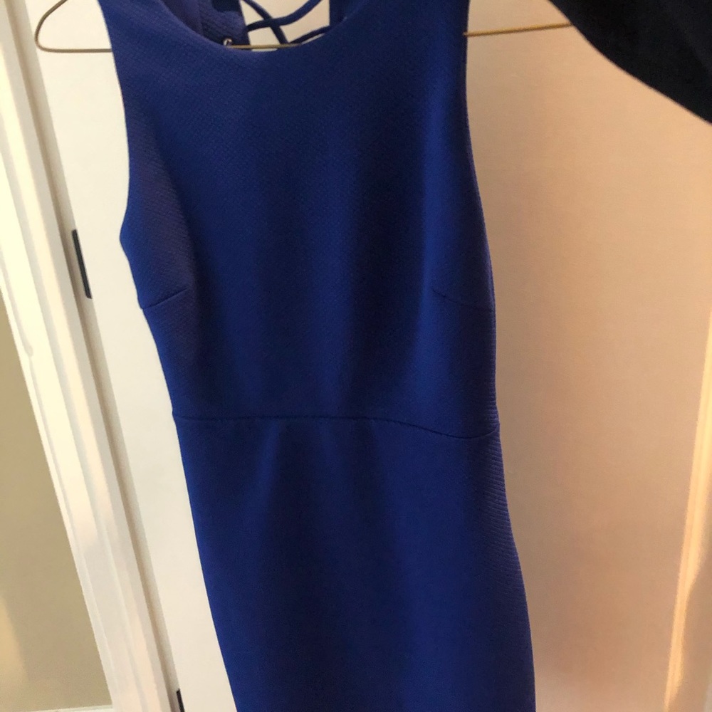 Blue bodycon dress with strappy back